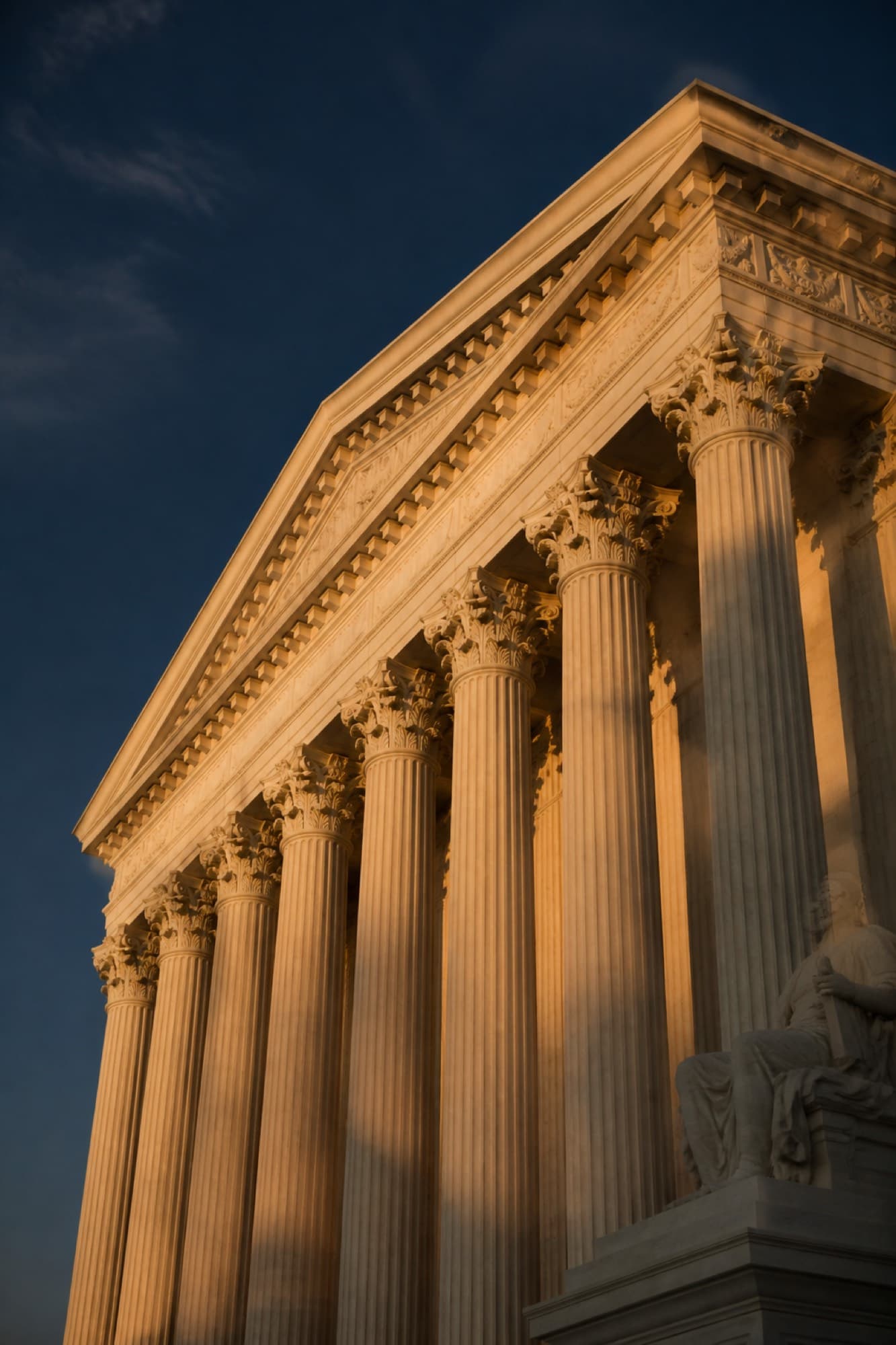 Neoclassical courthouse columns at dusk